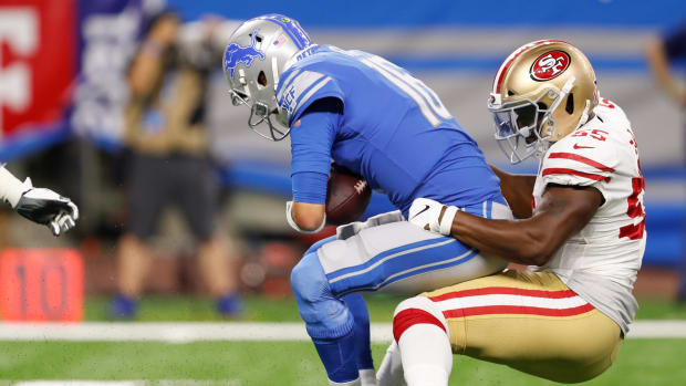 Sep 12, 2021; Detroit, Michigan, USA; Detroit Lions quarterback Jared Goff (16) gets sacked by San Francisco 49ers outside linebacker Dee Ford (55) during the second quarter at Ford Field.